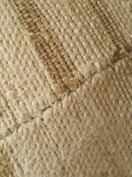 Subtle and minimal, let stripes in neutral tones add a touch of relaxed resort chicness to any space. Turkish kilim.